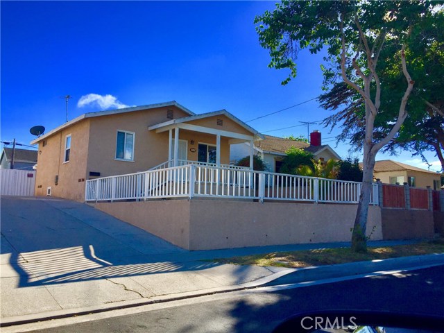 4548 170th Street W Lawndale, California COZY HOME HIGH ON A HILL WITH CITY VIEWS! FRONT PORCH, BACK PATIO WITH YARD AND HUGE LOT. 2+ CAR GARAGE - PETS OK! *** REMODELED AND CLEAN *** - Open Floorplan living and kitchen in this 960 sq. ft. remodeled 3 bdrm and 1 3/4 bath home. Lovely front porch allows for chairs and table to relax and enjoy the view. Picket white fence and front lawn bring privacy and visibility to the property. Home has newer tile flooring throughout, new paint, new kitchen with island, granite counters in kitchen/baths, skylights, washer and dryer hookups, private large backyard with grass and cement patio - great for bbq's! - Huge 2+ car garage - (potential workroom) PLENTY of driveway for RV, Boat, 3 cars, etc. Exceptional property! Close to shopping, 405 Freeway and ONLY 4 Miles to Beach! - 2 minutes to entertainment venues, restaurants, sporting, piers, and parks. AVAILABLE NOVEMBER 1ST.