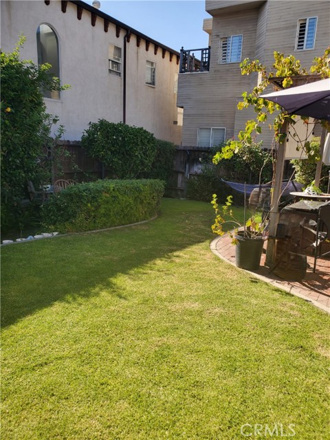 Vacant 1/2 lot used as yard by front duplex unit Vacant 1/2 lot used as yard by front duplex unit