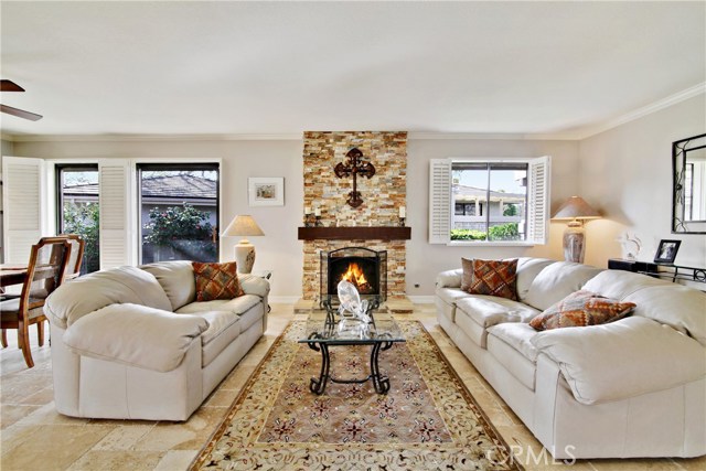 Stacked stone Fireplace and mantel recently redone.