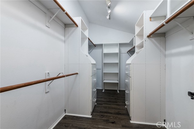 His and hers main bedroom walk-in closet