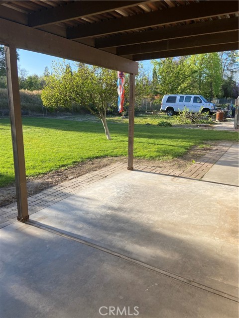 Covered patio, enjoy large back yard.