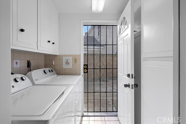 Laundry room and secure door to South side of house/patio