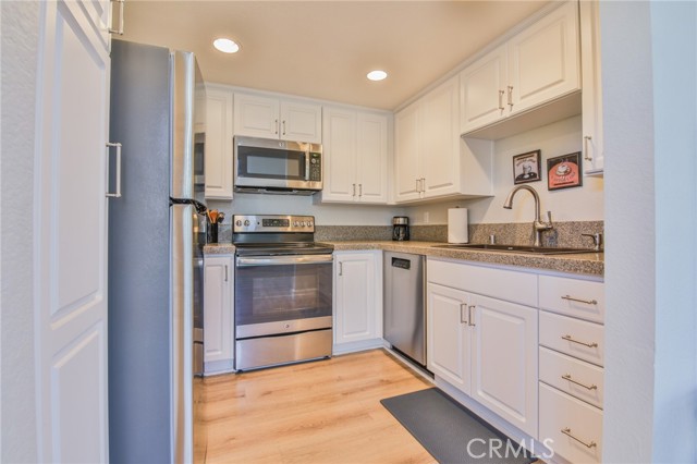 Updated kitchen, stainless appliances, Granite Transformations counter tops