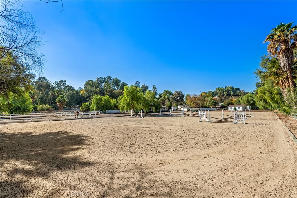 Great opportunity to expand on or develop an extremely rare, approx. 2.33 acre flat lot at the very end of a quiet cul de sac. Existing small home on the property sold as-is. This super prime lot is suitable for a large estate home with a guest house, separate gym, equestrian facilities, sports court, huge yard, fruit orchard and much more. Very rarely does a lot with this much flat land become available. Seller has a preliminary floor plan and elevations for a new custom home on the property done by architect Richard Landry. Don't miss it!