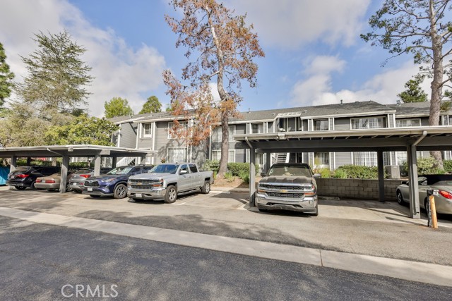 Gated community 2 carport spaces and lots of visitors parking