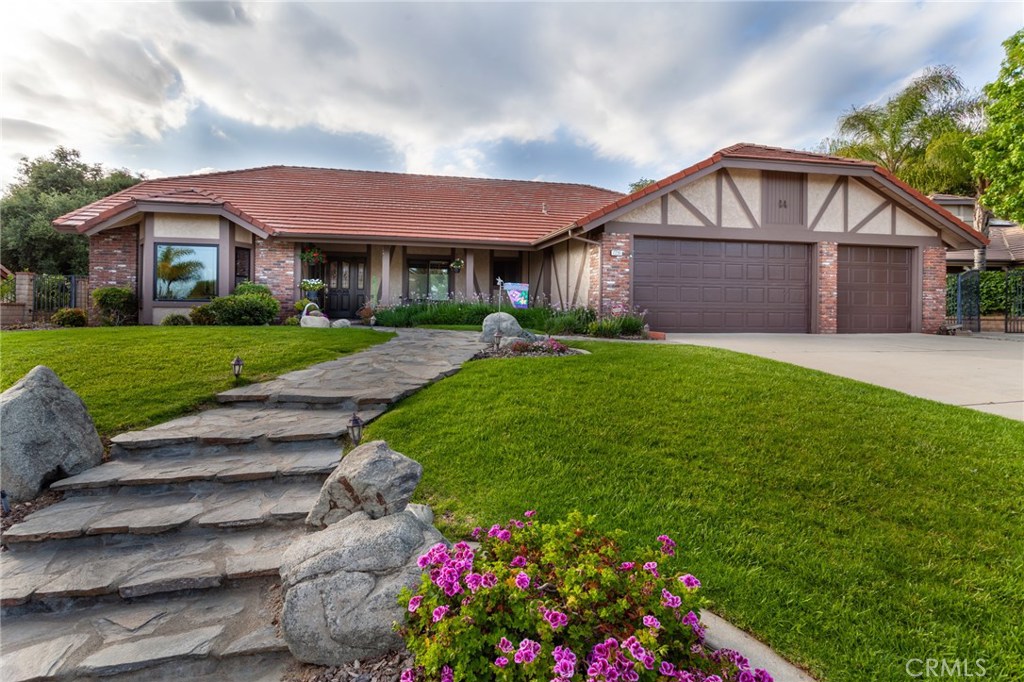 Opportunity knocks!! Fantastic North La Verne ranch style house is a must-see. This 3 bedrooms 2.5 bathroom home is perfect for entertaining or an expanding family. Enjoy the views of the Foothills that few homes offer. With an interior square footage of 2,781 this home has a large living room, formal dining area, family room with a wood-burning fireplace, master bedroom with large master bathroom, kitchen, and breakfast nook that provides views that will make you want to eat every meal there. There was a 4th bedroom that owners turned into an office but could easily be converted back. The Backyard features include a spa with a river rock waterfall that flows into the pool, a large patio area perfect for BBQing/dining, and 2 separate deck areas to enjoy the views.