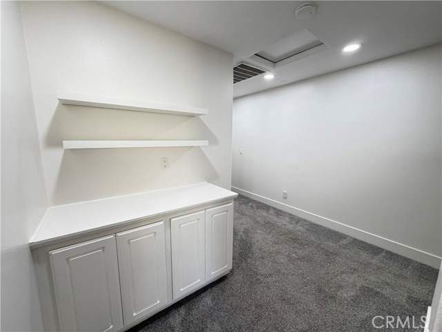 Stairway Landing With Built In Cabinets