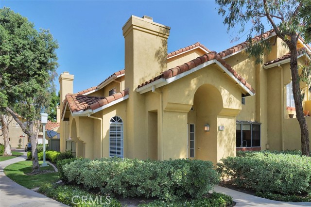 36 Abrazo Aisle 391 Irvine, California This lovely very private end unit townhouse located at highly desirable community of WestPark. The unit is fresh painted, beautiful laminate flooring, vault ceiling at the entrance and many windows provides natural light. 3 bedroom and 2 full bathroom (main floor with one bedroom and one full bathroom) and 2 car attached garage. The kitchen with granite countertops and opens to the living area, family room with cozy fireplace. It has nice patio for having morning coffee or afternoon tea or yoga practice area or reading area, guest parkings are close by. Central location and easy access to beach, shopping center and business district. It has top rated schools and community offers many amenities like swimming pools and parks. Must-See.
