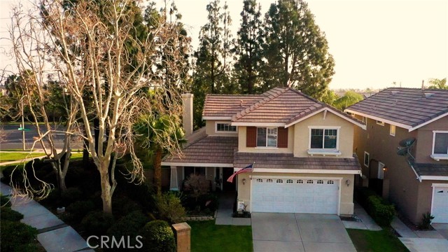 11737 Pavola Drive Rancho Cucamonga, California Upgrades galore!! Fall in love with this beautiful upgraded Victoria home walking distance to the park, schools and only a few minutes drive to Victoria Gardens outdoor shopping mall. This home is sure to impress with its extensive custom build ins and custom finishes. The interior boasts custom paint, laminate floors, custom wall of shelving and fireplace mantle. Build ins extend into kitchen that boasts glass cabinet fronts and built in hutch. The kitchen offers subway tile backsplash and granite counter tops. Formal sitting room has custom window valances and plantation shutters that can be closed or opened to extend to the living room space. The second level offers a large tech deck area or can be used as a loft (currently used as a loft) as well as 3 spacious bedrooms. The master bedroom offers crown molding and a large picture window. The master also offers a walk in closet and attached bathroom with dual sinks and updated vanity. The secondary bedroom has a wall of build ins with shelves, window seat and wainscoting. On a clear day, the secondary bedrooms and front porch offer views of the mountains. The rear of the home offers a large side yard, covered back patio, and there is a small shed in the back that will remain with the home at closing. Victoria has lit walking paths throughout and is known for its multitude of parks. This one has it all... and it is sure not to disappoint - see it today!!