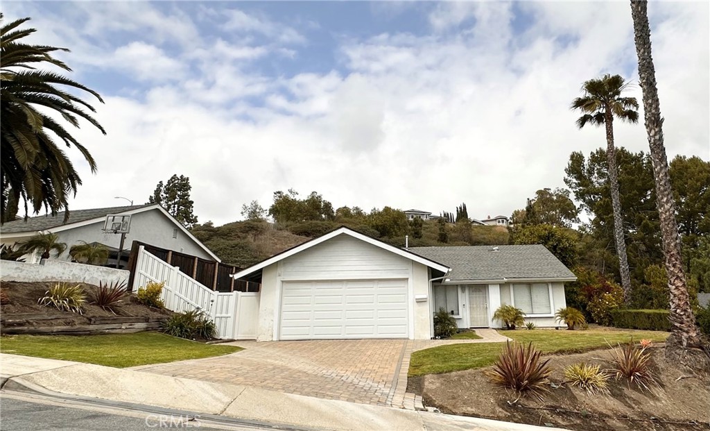 Remodeled Laguna Niguel single level home in the highly desirable community of Niguel Hills. The property recently went through a remodel throughout featuring new LVP flooring, new kitchen, new bathrooms, new ceiling fans, new installed AC unit, new lighting, new landscaping and so much more.
Entering the home you are greeted with the large living room and dining rooms, an abundance of natural light fills the house with warmth. The open and spacious kitchen, you will notice offers extra storage space as well as large counter space with new quartz counter tops, new stainless steel kitchen sink and faucet, new stainless steel cooking fan vent.
Patio sliding window door leads to large back yard grass area and side yard. Potential for large ADU to be built in back yard.
As you make your way down the hallway, you have additional storage in two different closets. The front 2 bedrooms with closets, one could be used as an office. The primary bedroom includes 2 tall windows, large closet space and new ceiling light and fan. The primary bathroom includes a new dual sink vanity with large counter space, new hardware, new stainless steel faucets, updated mirrors and lighting, new medicine cabinet. Hallway bathroom includes a new shower tub kit, new vanity, updated mirror and lighting. The 4th bedroom is down the hallway along with the laundry room that leads to an oversized two car attached garage. Front driveway with updated pavers. Front yard grass areas, palm trees and other colorful plants to add to the design and curb appeal.
Centrally located close to shopping, restaurants, parks, Dana Point harbor and beaches are less than a 10 minute drive away. 
Located on the oceanside of the freeway.