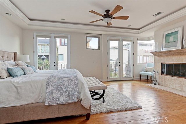 Open the French doors of this romantic master suite and step out onto the Juliette balconies - hear the waves turn on your fireplace and enjoy this exceptional beach lifestyle.