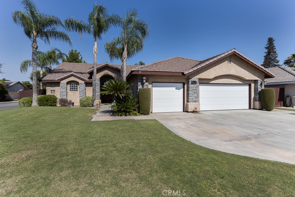 906 Coyote Springs Drive Bakersfield, California Lovely turnkey home with true Pride of Ownership! This corner lot home with 4 bedroom, 2 bath is situated in the Spring Meadow neighborhood, close to schools, parks, and shopping. The interior features tile flooring throughout, vaulted ceilings, updated kitchen with granite counter tops and upgraded double oven and stove top. With an open floor plan the kitchen and large family room/dining area give plenty of space to relax and entertain. Designed with a split wing floor plan the master bedroom offers plenty of privacy with its own access to the backyard and covered cement patio just outside the door. The backyard features include maintained landscaping, mature fruit trees along the back including nectarine, orange, Meyer lemon, apple, pear, and pomegranate. Just outside of the kitchen you walk out onto a cement patio for entertaining including an above ground spa.