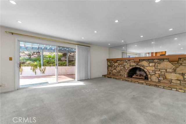 Family den with fireplace