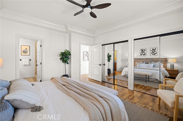 Primary bedroom with double closets.