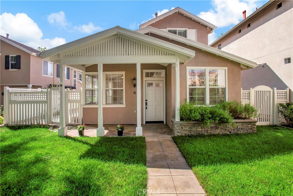 Wonderful location in the heart of Rancho Santa Margarita, this white picket fence residence is located in one of the most private settings within the gated community of Los Paseos.  The charming cottage-styled detached home has been recently upgraded with new paint, carpet, flooring, bath room counters, and lighting throughout.  This lovely two story home includes one bedroom and full bath room downstairs, along with two bedrooms suites upstairs with their own baths with tree lined views, complimented secondary closet, plus spacious master bath room with separate tub, shower, and two vanities.  Each bedroom upstairs have closet organizers.  Elevated ceilings and plenty of windows for natural light, with sliding doors that connect to a gracious side patio that is perfect for all your outdoor entertainment.  The front yard is also fenced and ajacent to walking trails connecting to the community, local shopping, and dining amenities.   Los Paseos offers residents a private pool and all within minutes of RSM'S shopping, parks, pools restaurants and public schools. 220 Outlet has been installed in garage for EV charging.