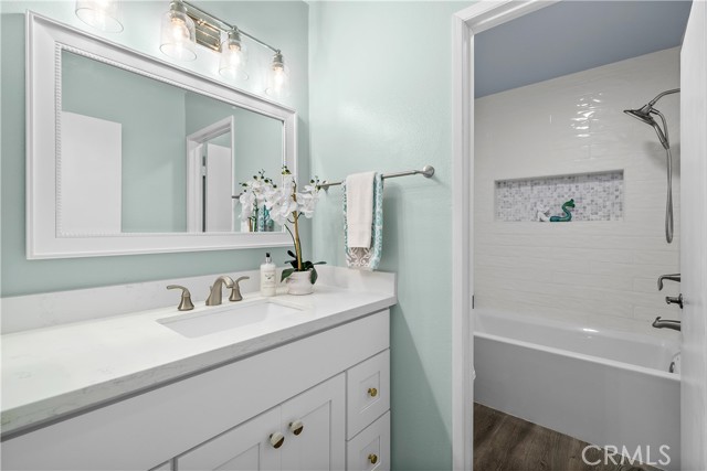 Remodeled master bathroom with twin vanity