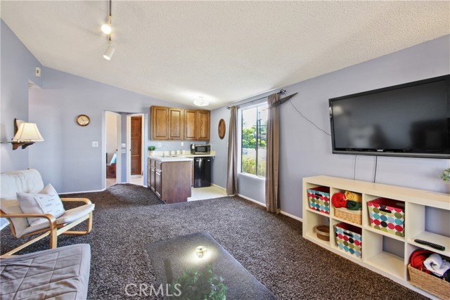 Upstairs family room with kitchenette!