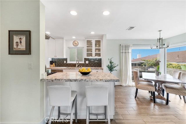 Upgraded kitchen includes a breakfast bar