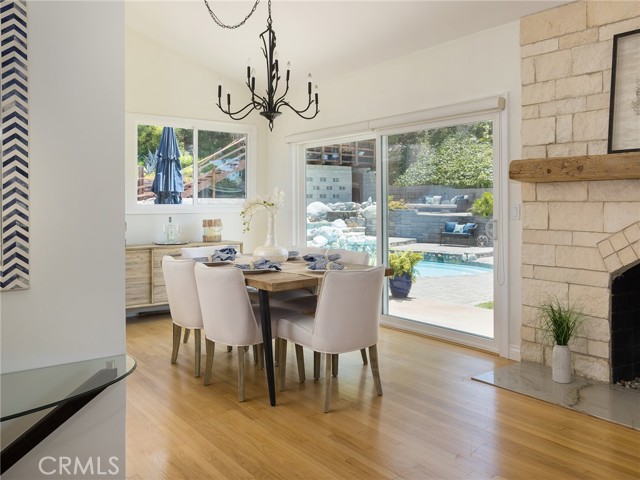 Fabulous view of huge yard and pool from dining area.