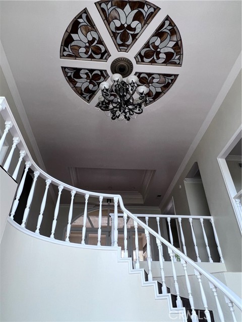 Vaulted ceiling from the dramatic foyer and semi circular stairway