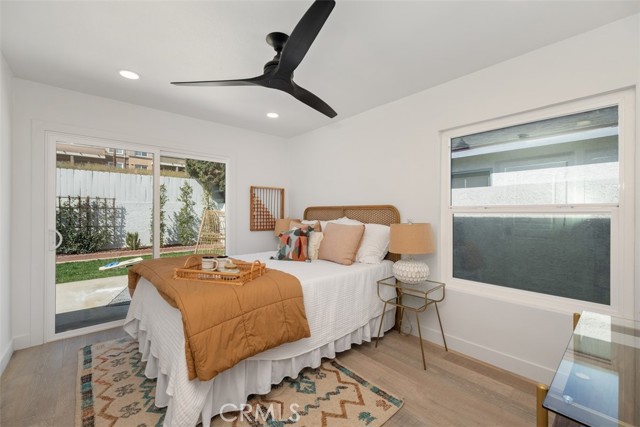 The second bedroom, also with a sliding glass door to the backyard.