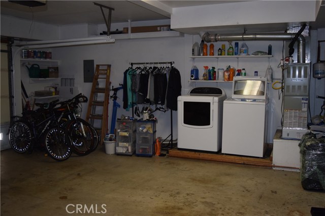 Private laundry and lots of storage in garage.