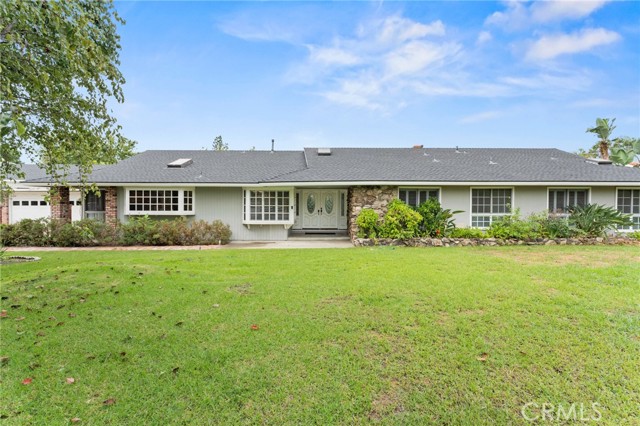 Honey , stop the car ! Check out this beautiful 3,083 sqft POOL home located in the heart of Yorba Linda . This is a beautiful home and sits on a 25,579 sqft lot and has an attached 3 car garage and along with its own 1 car garage/ workshop . There is also a 400 + sqft dance studio that can possibly be converted into its own ADU space/room . This home is looking for its next family to call it home and has so much to offer . Inside the home you will find a large living room with a fireplace, open floor concept and an amazing layout . The interior offers 4 bedrooms and 3 bathrooms with a large master and bath . The kitchen is spacious, has plenty of storage and is great for a special occasion . Throughout the interior of the home you will find large windows boosting its natural lighting and openness of the home, including multiple skylights. The exterior of the home offers plenty of shade , fruit trees , beautiful attached patio on rear of home , rock pool with slide and room to do your own gardening . You must see this home to appreciate it , but hurry fast because it will not last lon