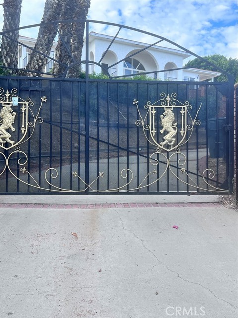 Arriving at a palatial and code secured gate off Palos Verdes Dr. East.