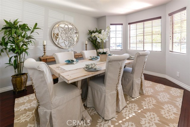 Formal dining room with bay windows