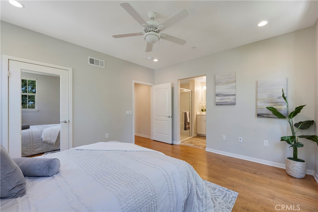 Master Bedroom has a walk-in closet with mirrored door!