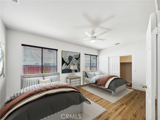 Extra large bedroom that was a builder option to be two separate bedrooms.Photos depict virtual staging and are not representative of current furnishings in the home.