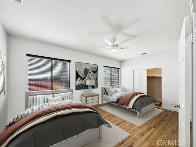 Extra large bedroom that was a builder option to be two separate bedrooms.Photos depict virtual staging and are not representative of current furnishings in the home.