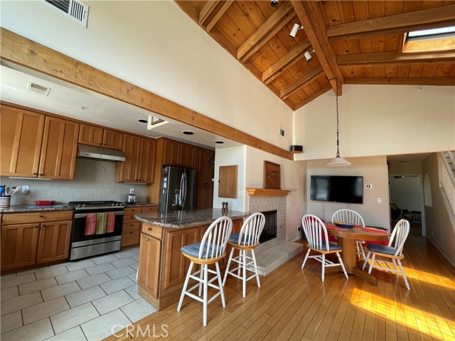Light & Bright Kitchen opens to Great Room, featuring gas fireplace!