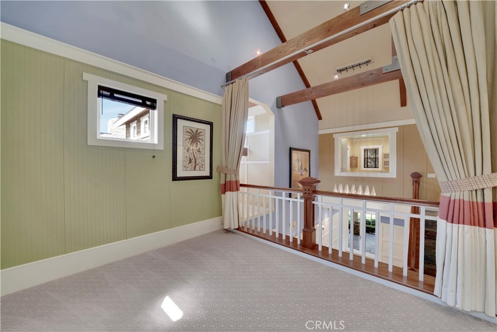loft opening to dramatic ceilings