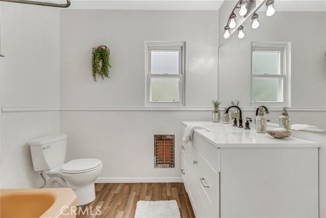 Main bath has door into Primary bedroom and hallway access.