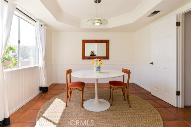 Just to the left of the entry is a formal dining room with great architectural detail in the ceiling.  The kitchen is off to the right.