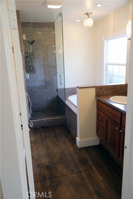 Master Bedroon with a walk in shower and Jacuzzi tub