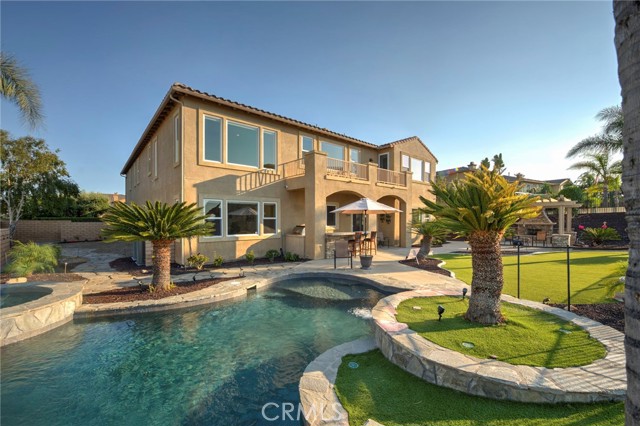 Backyard view with pebble tec pool & spa