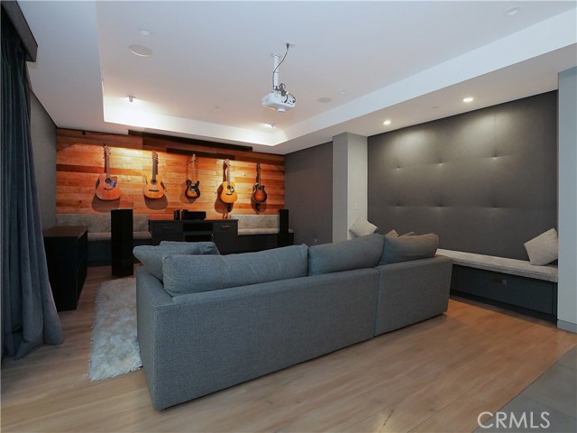 Movie theatre with built in projector and built in storage benches.