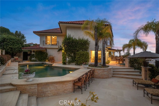 Pool with View of Upstairs Master Bedroom, Family Room and BBQ Area