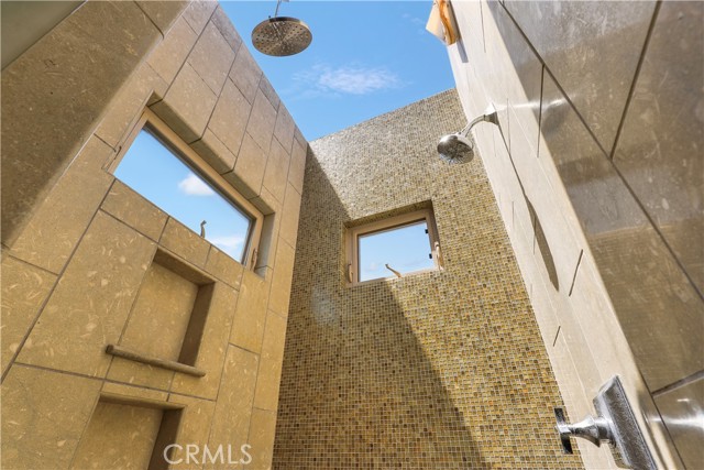 One of my favorite features....This is the primary suite shower with window for a ceiling giving a cool feeling of indoor/outdoor :)