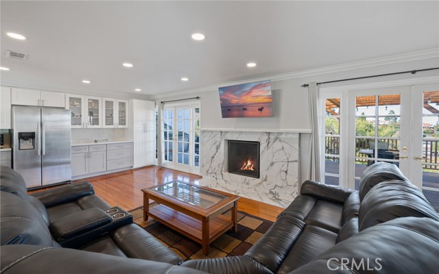 Spacious living room with amazing French doors leading out to the amazing decks.