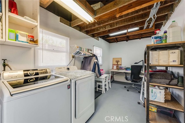 Separate laundry area with craft room