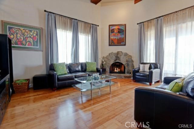 Living Room with Expansive 16.5 foot  High Ceilings and Gas Fireplace