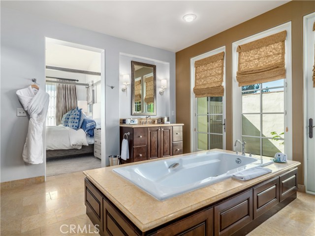 Sunlight filled master bathroom