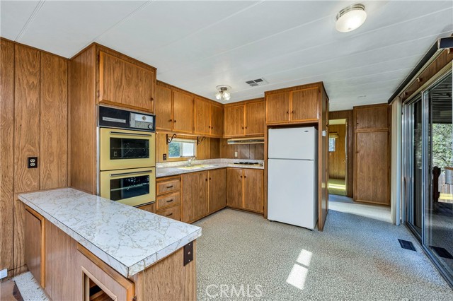 Kitchen opens to living room