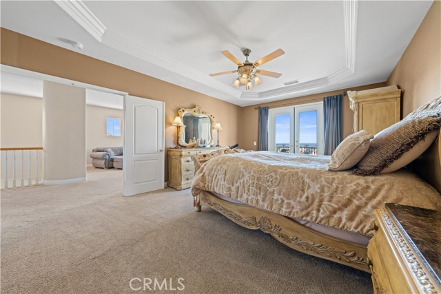Another view of the primary suite with double door entry.