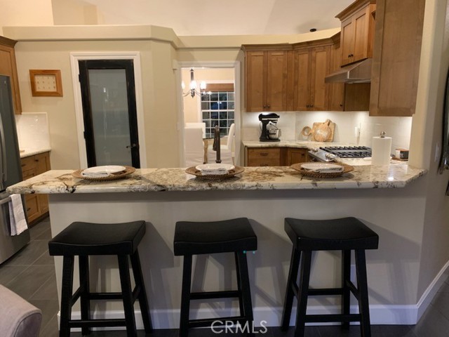 Granite Eating Bar off Kitchen