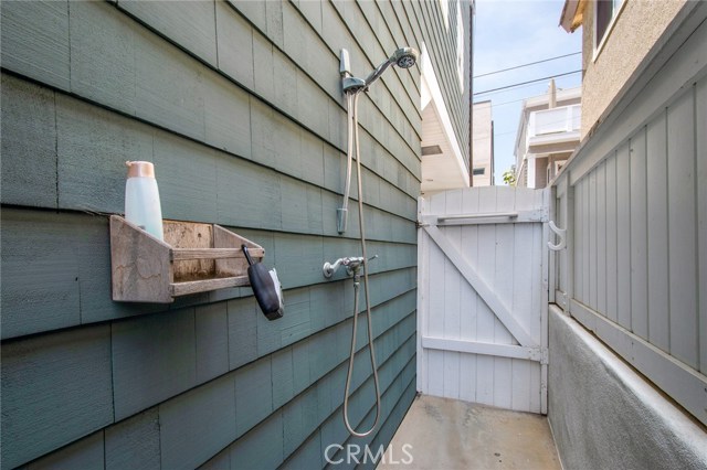 Outside shower off the north east side of home.