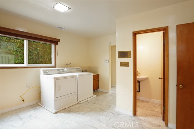 Large laundry room and powder room